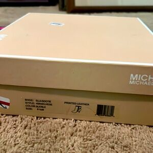 Gently used MK Ella Booties. Size 9 1/2.